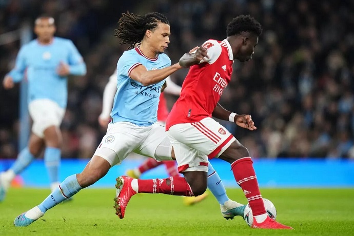 Nathan Ake: Man City sẽ không bị phân tâm bởi các chiến thắng của Arsenal - Ảnh 1